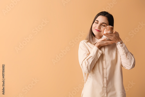 Beautiful young woman with ...