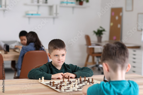 Little children playing che...