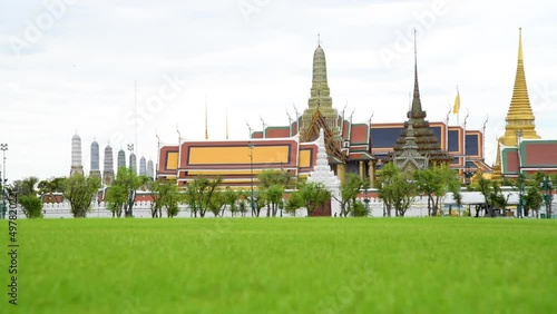 4k panning footage of Wat Phra Kaew Temple of the Emerald Buddha, grand palace the most famous tourist spot and must visit Temple in Bangkok, Thailand.