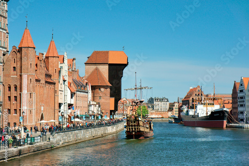 Gdansk Poland. Old Town. Looking down Dlugie Pobrzeze to Mariacka Gate and the Crane Gate on the Motlawa River tourist area
