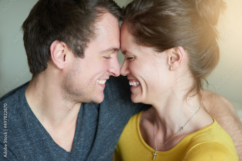 You are my favourite reason to smile. Shot of a loving couple showing each other affection at home. You are my favourite reason to smile. Shot of a loving couple showing each other affection at home.