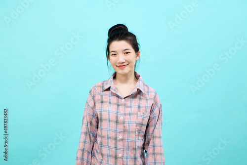 Asian woman smiling and looking happy