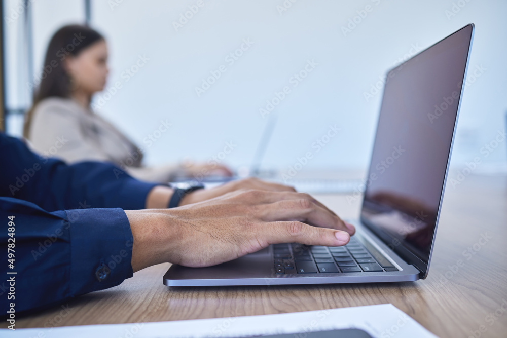 The more productive you are, the more you will benefit. Closeup shot of an unrecognisable businessman working on a laptop in an office.