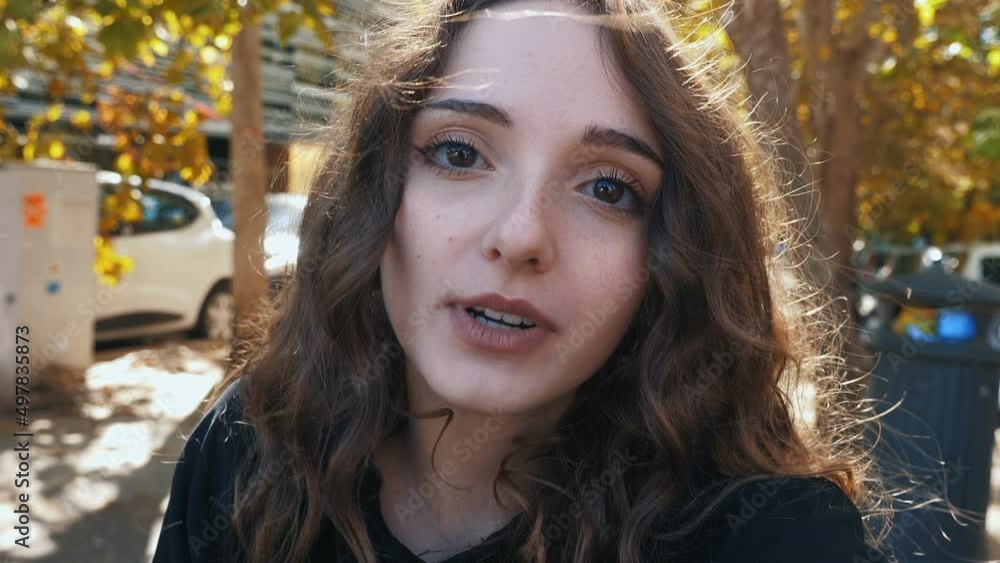 visual communication - young woman talks in video call on smartphone visual communication - young woman talks in video call on smartphone