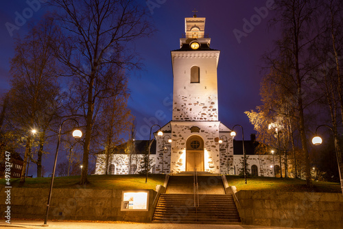 Old Lutheran Cathedral of Kuopio city in night autumn landscape. Finland