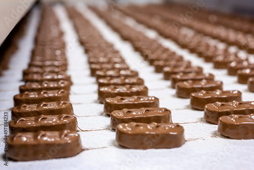 Production of chocolate bars. Confectionery factory. photo