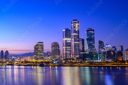 Cityscape night view of Yeouido, Seoul at sunset time © SEUNGJIN