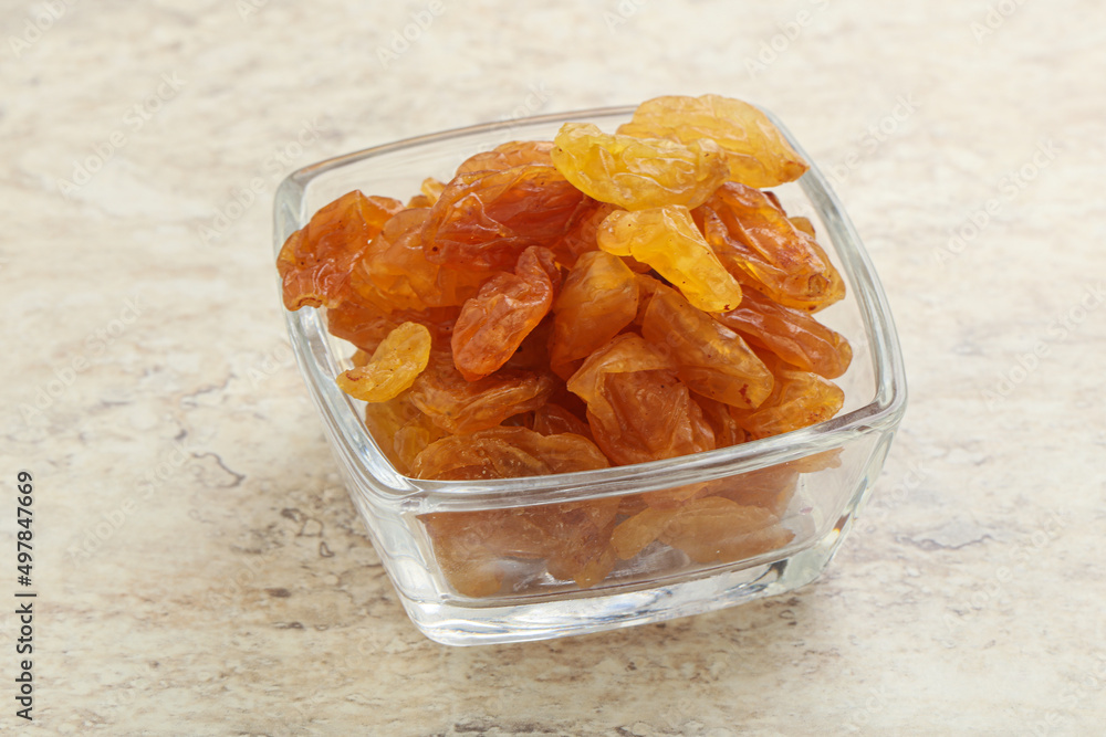 Sweet yellow raisin in the bowl