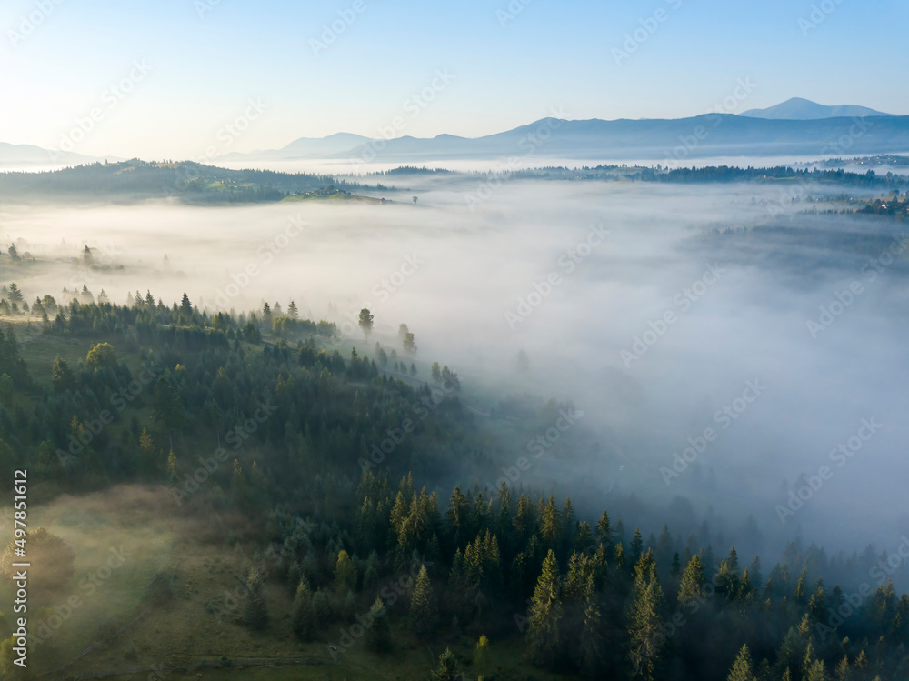Morning mist in Ukrainian Carpathian mountains. Aerial drone view. Morning mist in Ukrainian Carpathian mountains. Aerial drone view.