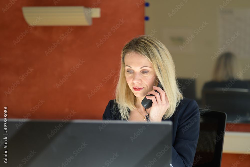 Business woman talking over phone. Business woman talking over phone.