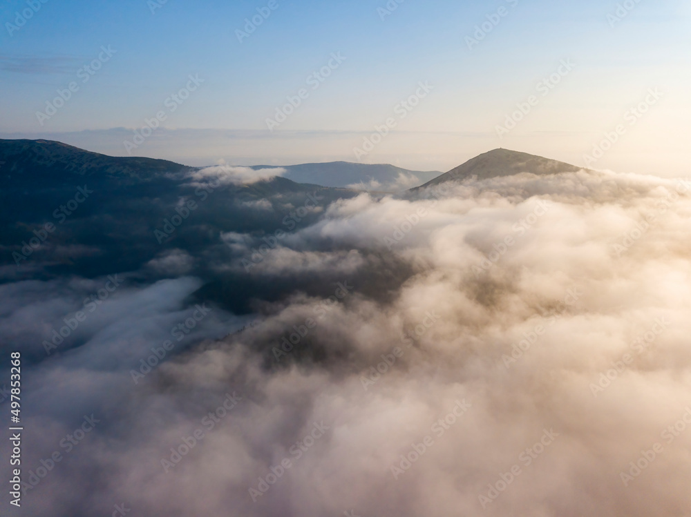 Morning fog in the Ukrainian Carpathians. Aerial drone view.