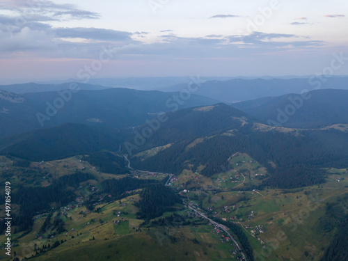 Sunset over the mountains in the Ukrainian Carpathians. Evening. Aerial drone view.