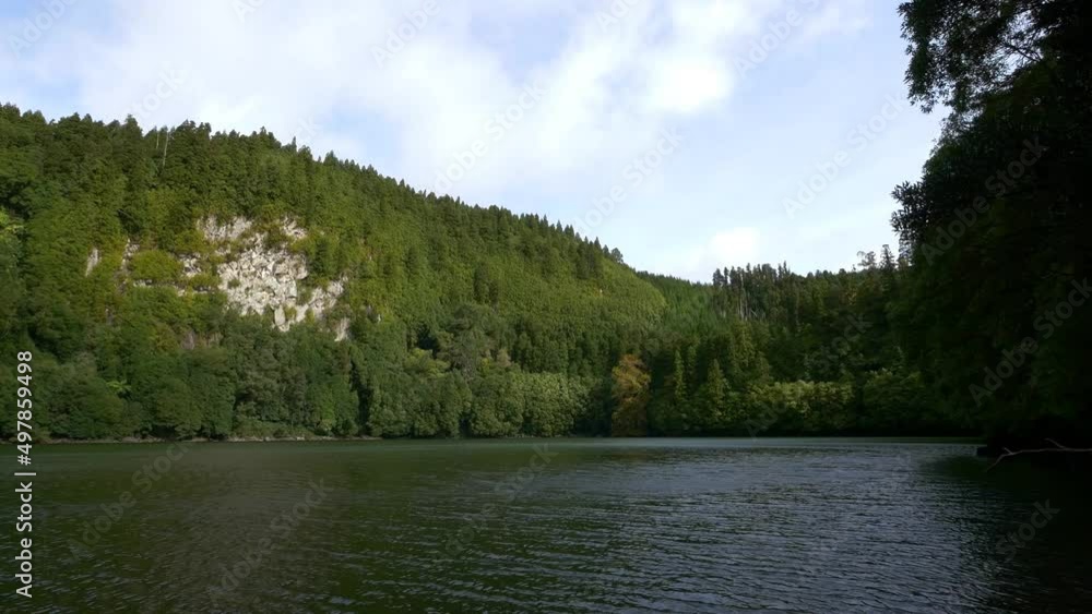 Rural Azores. Along the banks of the Lagoon Congro with trees Rural Azores. Along the banks of the Lagoon Congro with trees