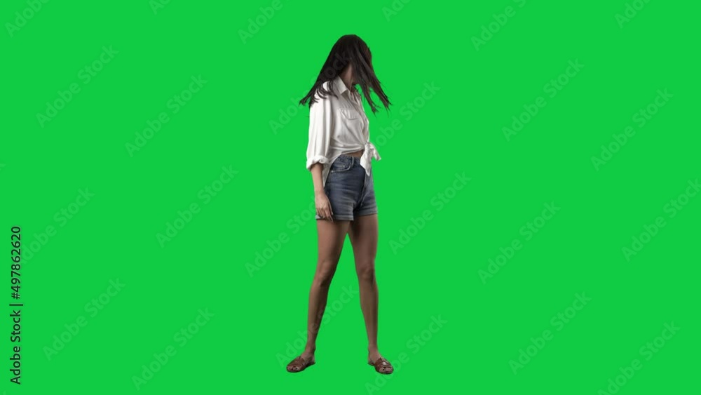 Joyful young woman shaking head tossing long hair in super slow motion. Full body isolated on green screen background Joyful young woman shaking head tossing long hair in super slow motion. Full body isolated on green screen background