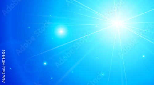 頭上から強い光に照らされる青色の背景