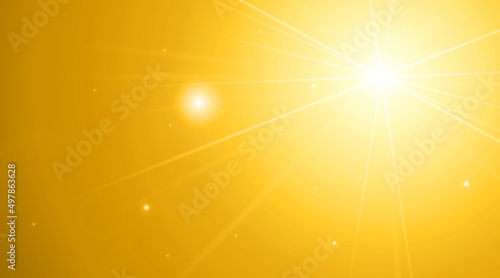 頭上から強い光に照らされる金色の背景