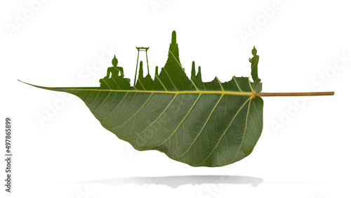 Vesak day concept:  wat arun on bodhi leaf with clipping path. photo