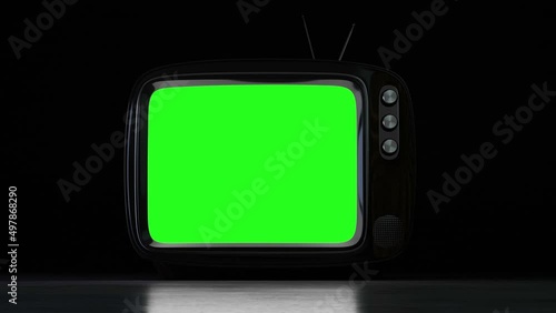 Turn on the retro TV with noise at the beginning, and switch to a green screen. night horror climate photo