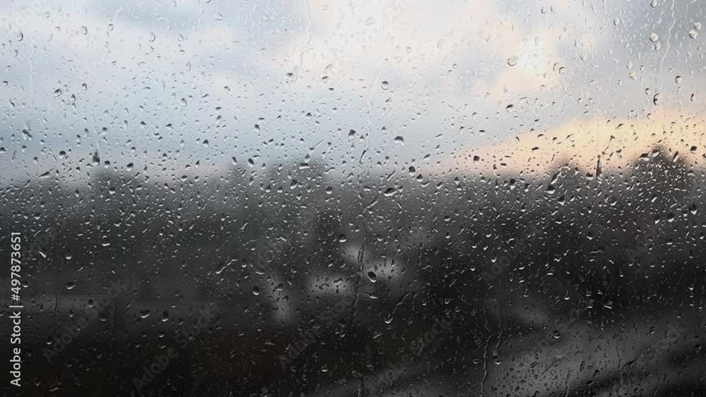 rainy days rain drops on the window surface rainy days rain drops on the window surface