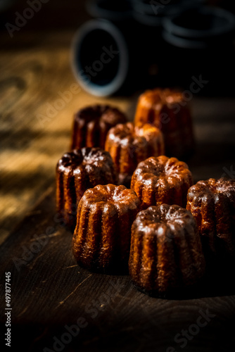 Canelé.
Traditional French sweet dessert.
 photo