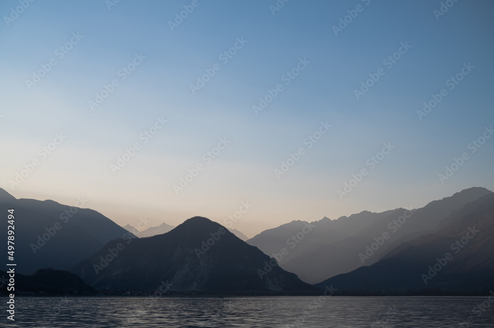 Beautiful sunset behind mountains of Lake Maggiore