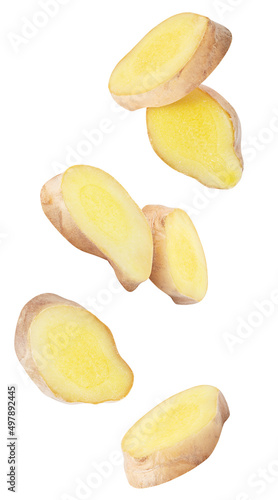Isolated ginger pieces in the air. Raw ginger slices falling down isolated on white background with clipping path