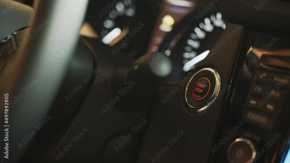 Track in to the button. Off car engine. Finger press the button to ...