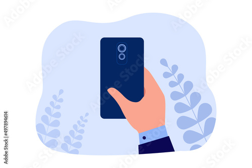 Human hand holding back side of mobile phone with rear camera. Backside view of male office workers arm using smartphone app flat vector illustration. Cellular communication, technology concept