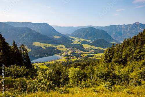 Perfect bird's eye view of a calm lake and green valley. Location Grundlsee, Austria, Europe.