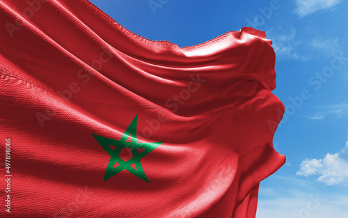 Tableau sur toile Moroccan Flag is Waving Against Blue Sky with Clouds