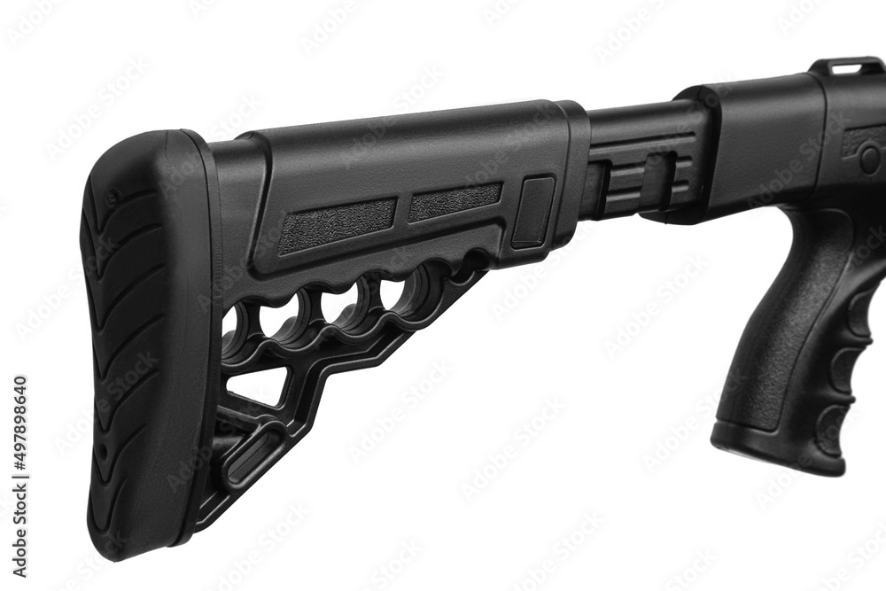 Pump-action 12 gauge shotgun isolated on a white back. Close-up shot of part of a shotgun. A smooth-bore weapon with a plastic stock. Pump-action 12 gauge shotgun isolated on a white back. Close-up shot of part of a shotgun. A smooth-bore weapon with a plastic stock.