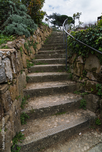 old medieval stone staircase with musk 