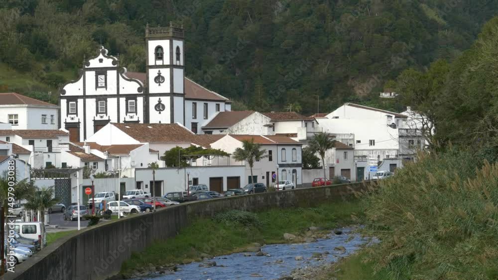 The town of Povoacao in the Azores. General view. Along the river The town of Povoacao in the Azores. General view. Along the river