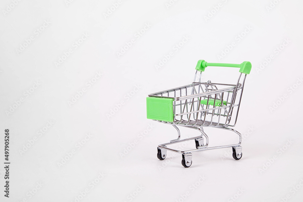 Empty shopping cart on wheels on a white background