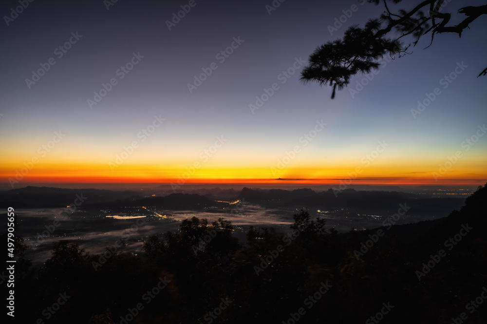 Beautiful sunrise with endless horizon on Phukradueang national park loei city thailand.Phu Kradueng National Park is one of the best known national parks of Thailand. Beautiful sunrise with endless horizon on Phukradueang national park loei city thailand.Phu Kradueng National Park is one of the best known national parks of Thailand.