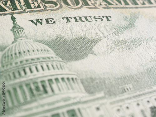 American paper money background. Fragment of reverse of $50 bill showing the Capitol. US banknote closeup. Backdrop about public national debt and the USA dollar. Bonds and treasurys. Macro