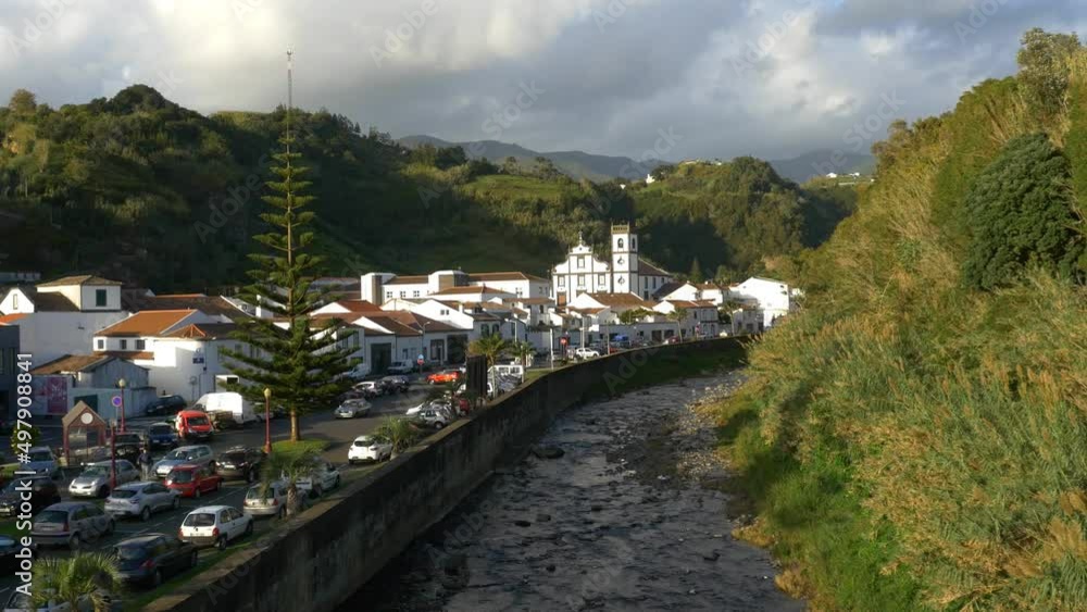 The town of Povoacao in the Azores. General view. Along the river The town of Povoacao in the Azores. General view. Along the river