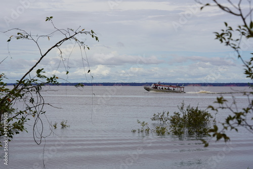 The usual form of transport in Amazon region of Brazil, where there are few roads. Here a speedboat made of aluminum, which brings residents of the surrounding area to the metropolis of Manaus, Brazil