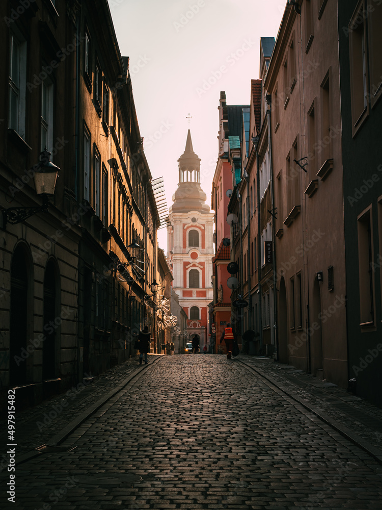 Poznan Basilica in sunset. Streets of Poland