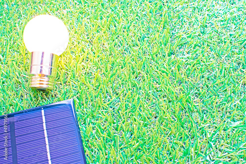 Wallpaper Mural grass and light bulb and solar panel Torontodigital.ca