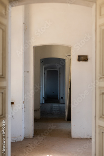 long corridor with arches in an old house in europe