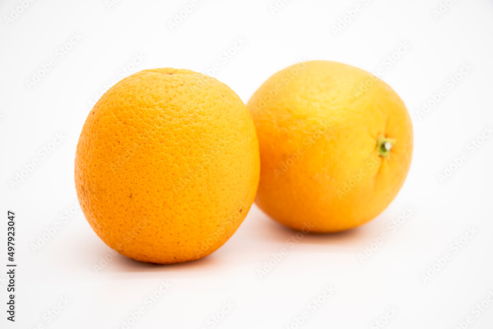 two Orange fruit isolate on white background, selective focus two Orange fruit isolate on white background, selective focus
