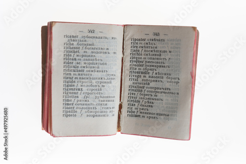 miniature Russian-French dictionary (focus point on cracked spine) 