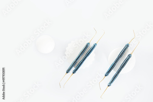 Modern dentistry. Dental instruments for the work of an orthodontist. Light background. Flat lay.Top view.Copy space.