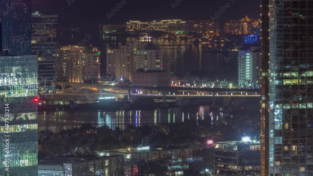 Office buildings in Dubai Internet City and Media City district aerial night timelapse Office buildings in Dubai Internet City and Media City district aerial night timelapse