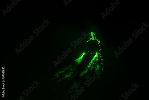 Neon man silhouette dark play laser show color light