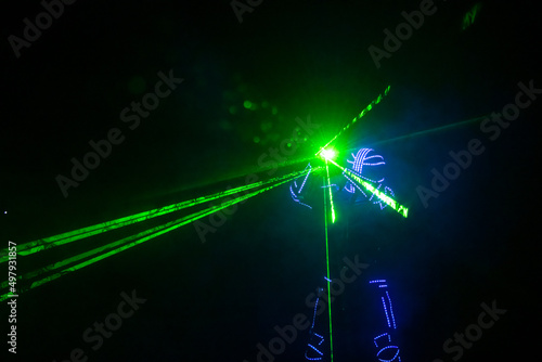 Neon man silhouette dark play laser show color light © Serhii