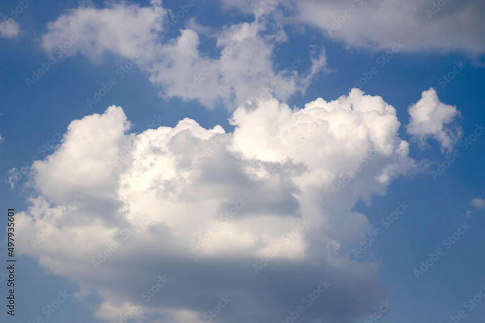 white clouds on a blue sky background