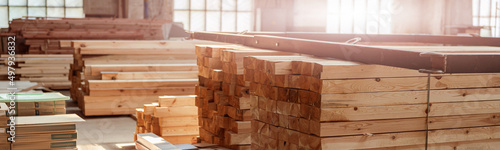 Obraz na plátně Wooden planks and boards in building under construction