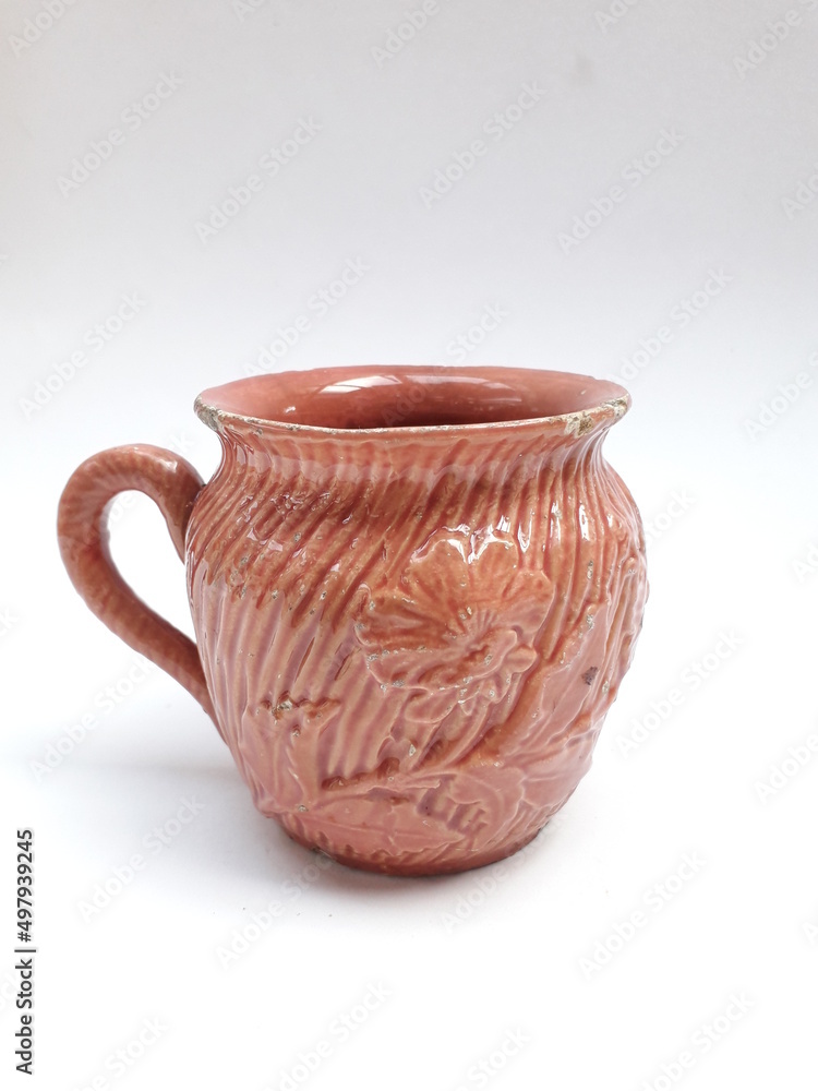 Antique majolica pot with flower pattern isolated Antique majolica pot with flower pattern isolated